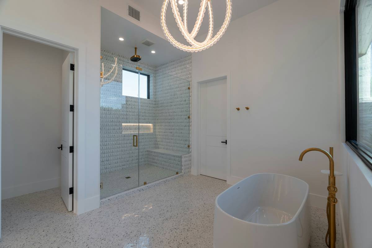 Bathroom installation showing shower system dual head benefit of ergonomic design and water savings