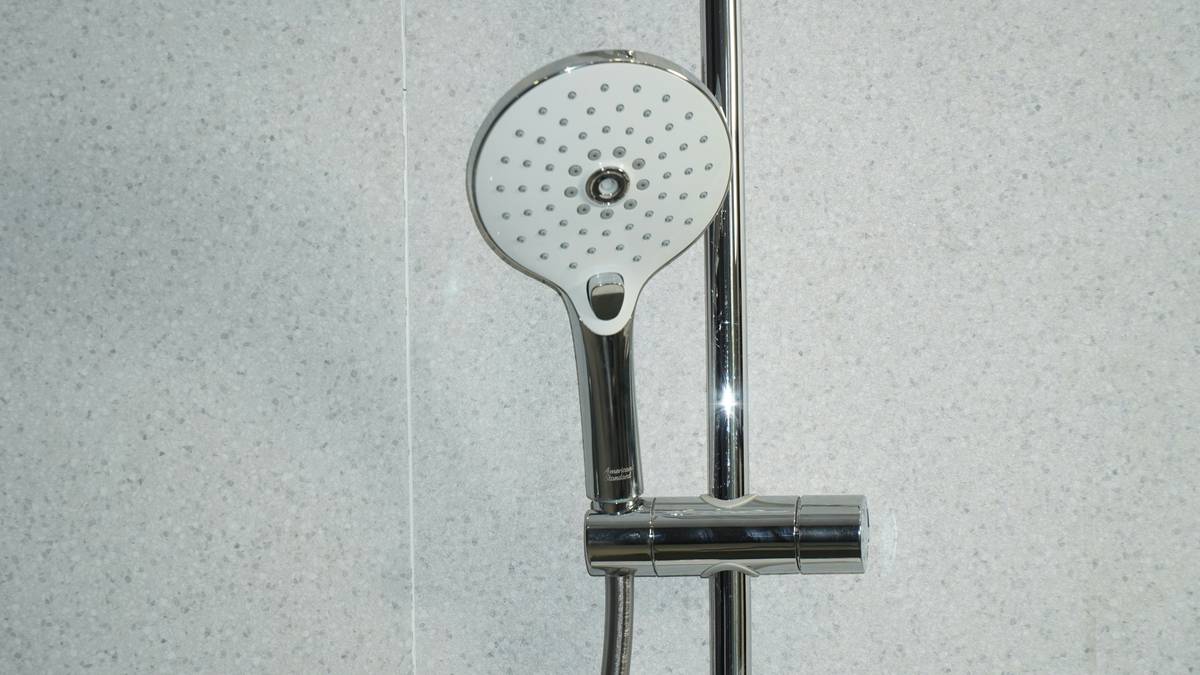 Modern dual function shower heads installed in a renovated bathroom